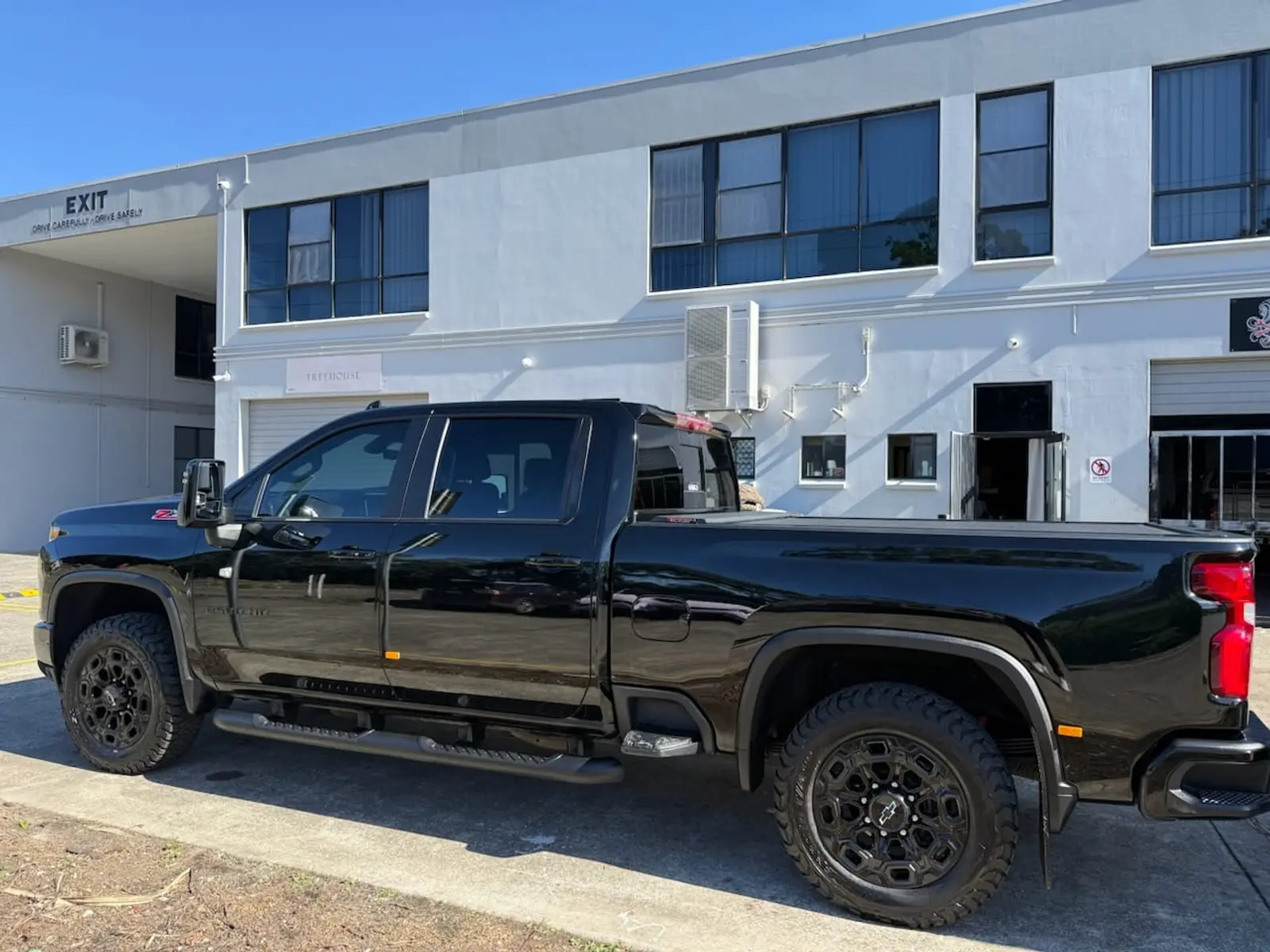 After: Black dual-cab ute from the business’s published before and after sequence